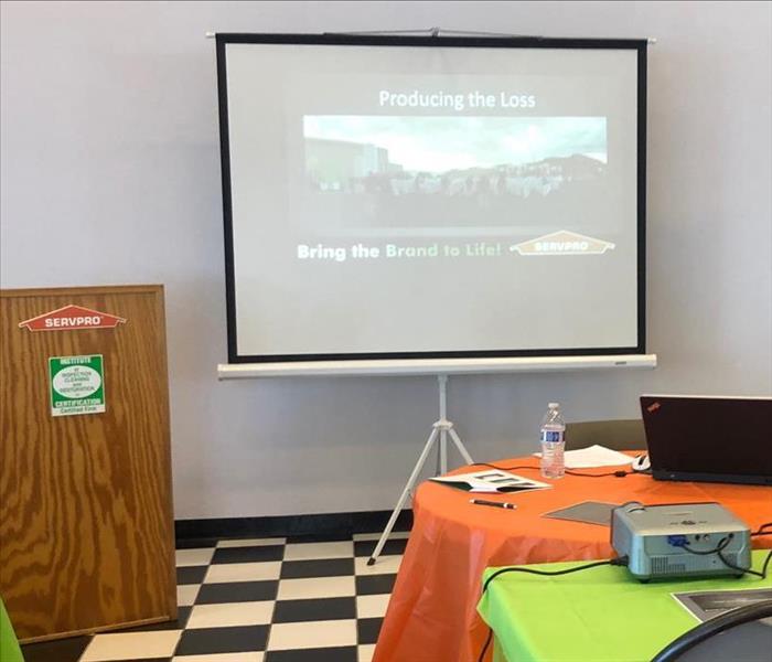 Class Room education by SERVPRO, Projection screen and podium