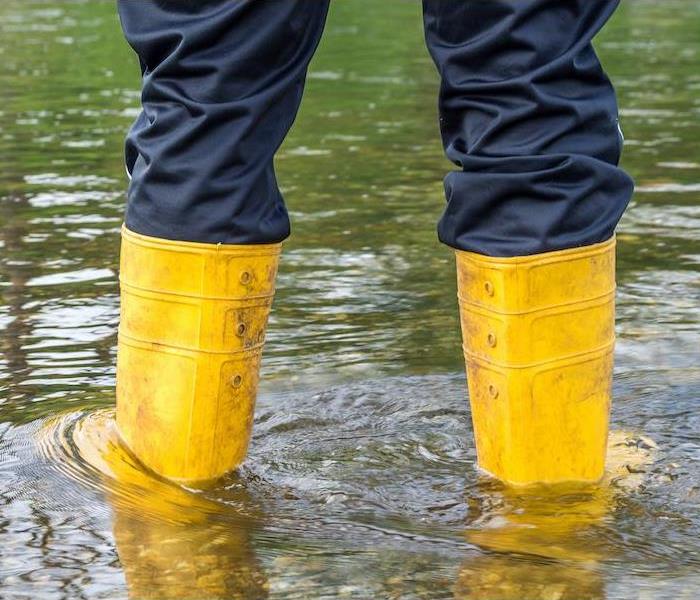 Boots in flood water